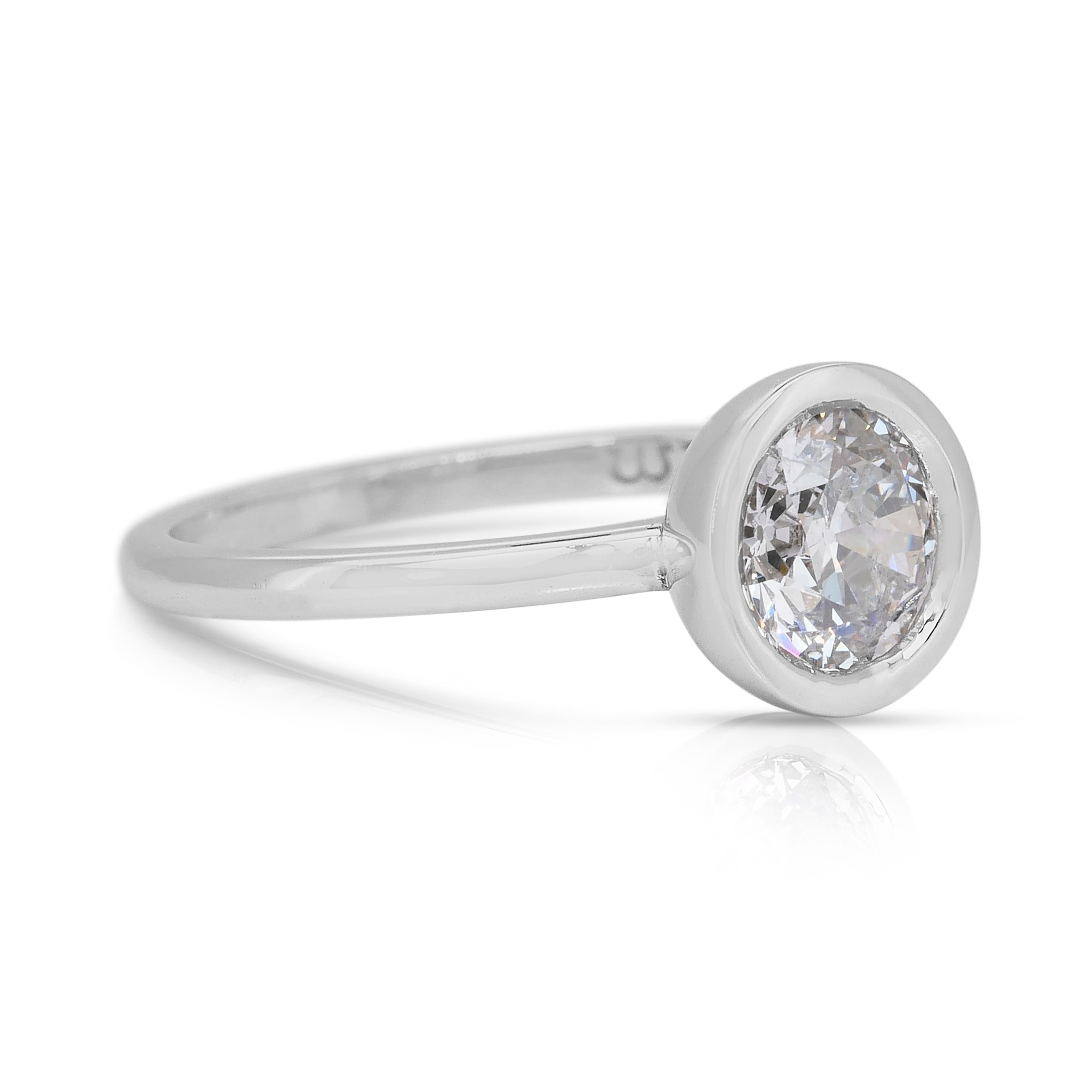 Bague solitaire classique en or blanc 18k avec 1,01ct de diamant - certifié IGI

Sobre et intemporelle, cette bague solitaire en or blanc 18 carats est ornée d'un superbe diamant rond brillant de 1,01 carat, un choix classique pour une élégance