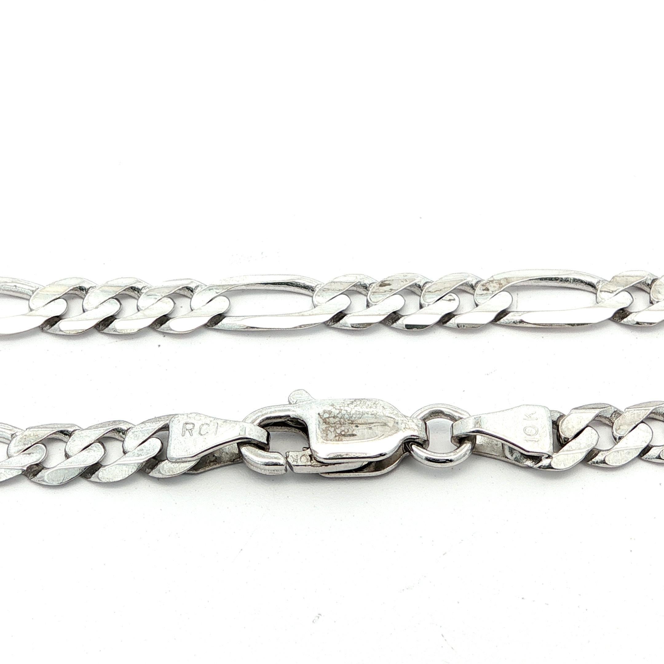 Material: Oro blanco macizo de 10 quilates 
Peso: 8,7 gramos 
Tipo: Cadena de eslabones Fígaro de 4.2 mm 
Longitud: 20
