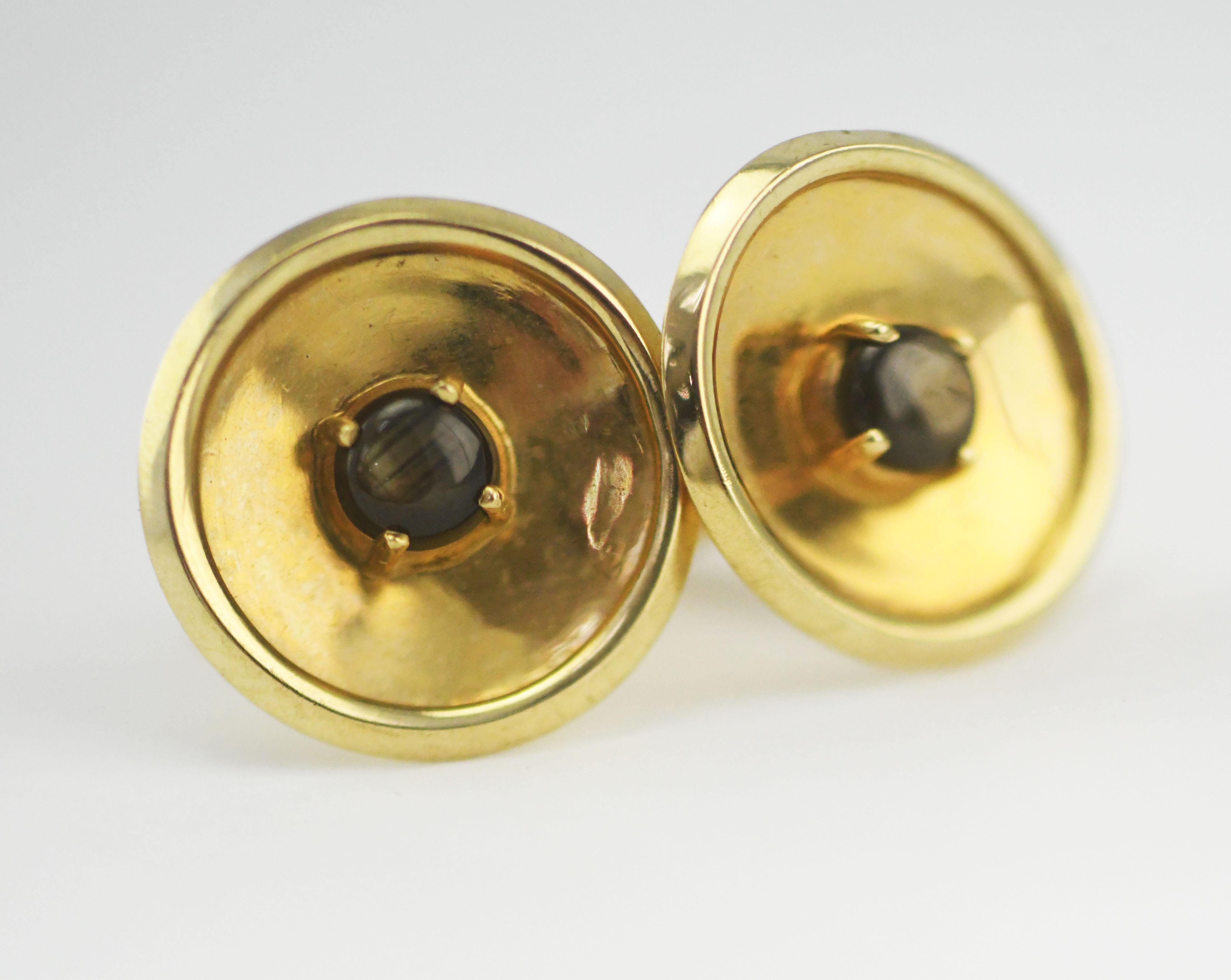 Classic 14 Karat Yellow Gold Round Cufflinks  Accented with Black Star Sapphires. 11.8 grams . The front is 20mm wide and they are  about 1 1/8