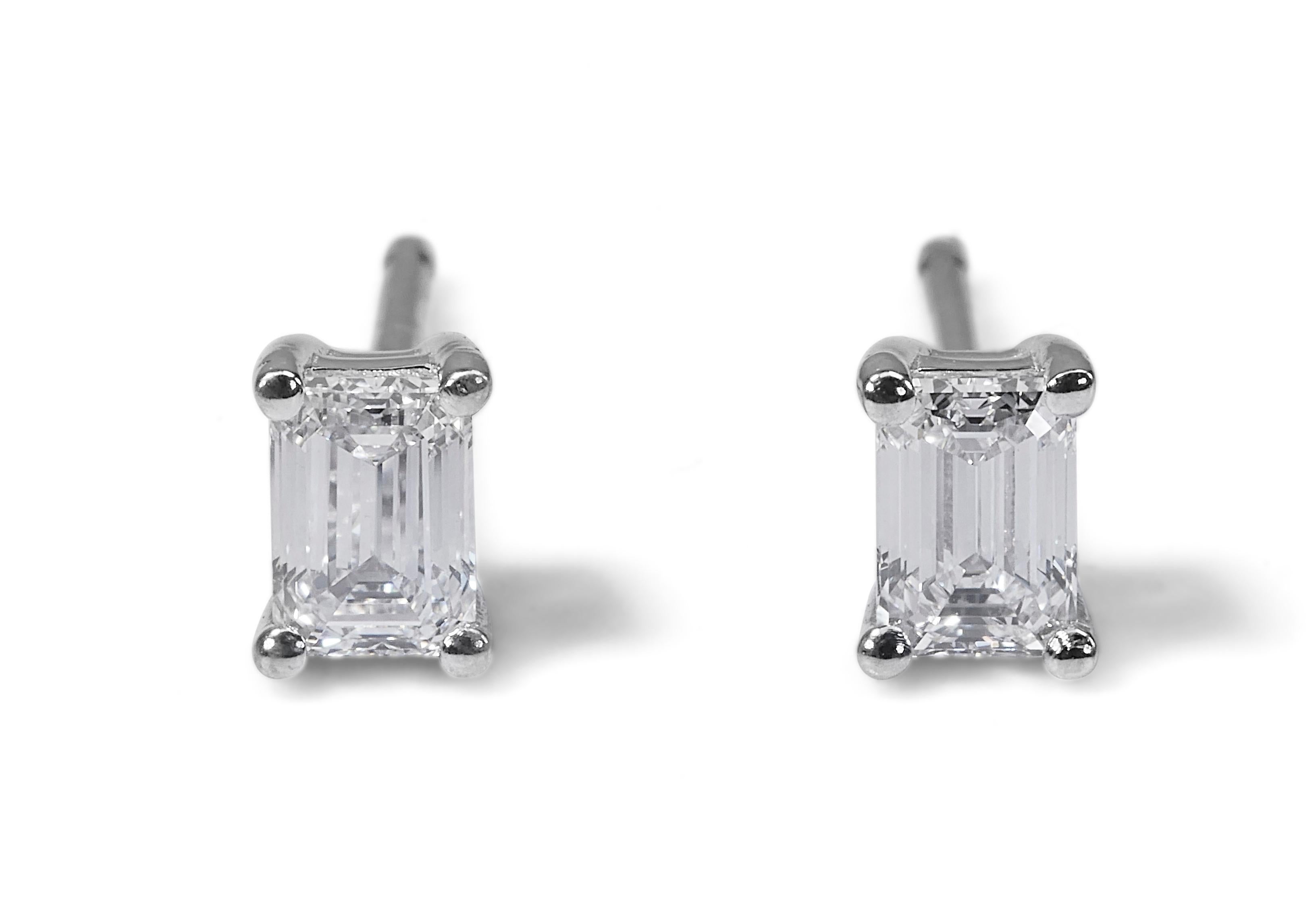 Classic 1.48ct Emerald-Cut Diamond Stud Earrings in 18k White Gold - GIA Certified

Elevate your style with these stunning diamond stud earrings, expertly crafted in 18k white gold. Each earring features a brilliant emerald-cut diamond, collectively