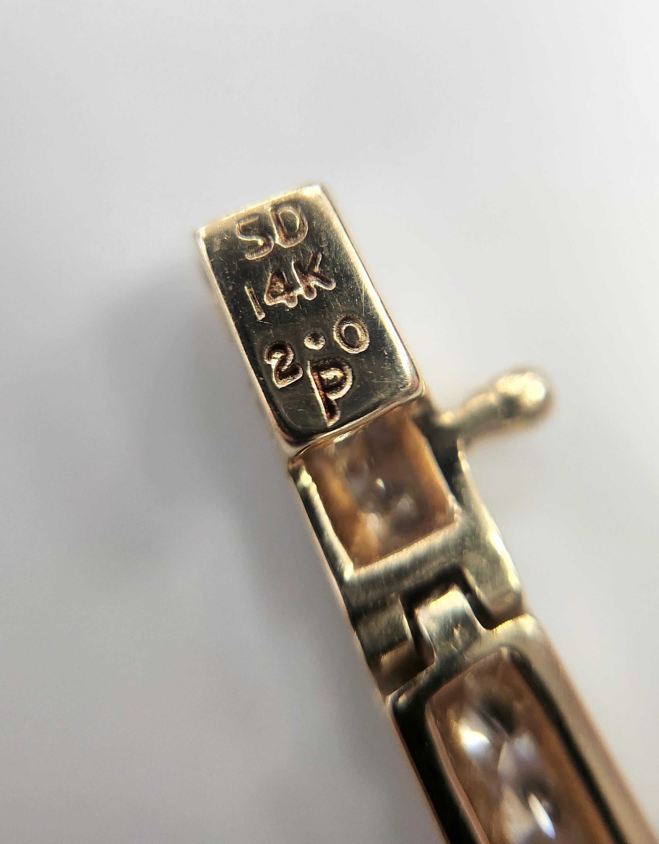 Pulsera de tenis clásica de oro de 14 quilates con canal de diamantes de 2 quilates, tamaño 7,25 pulgadas en venta 1