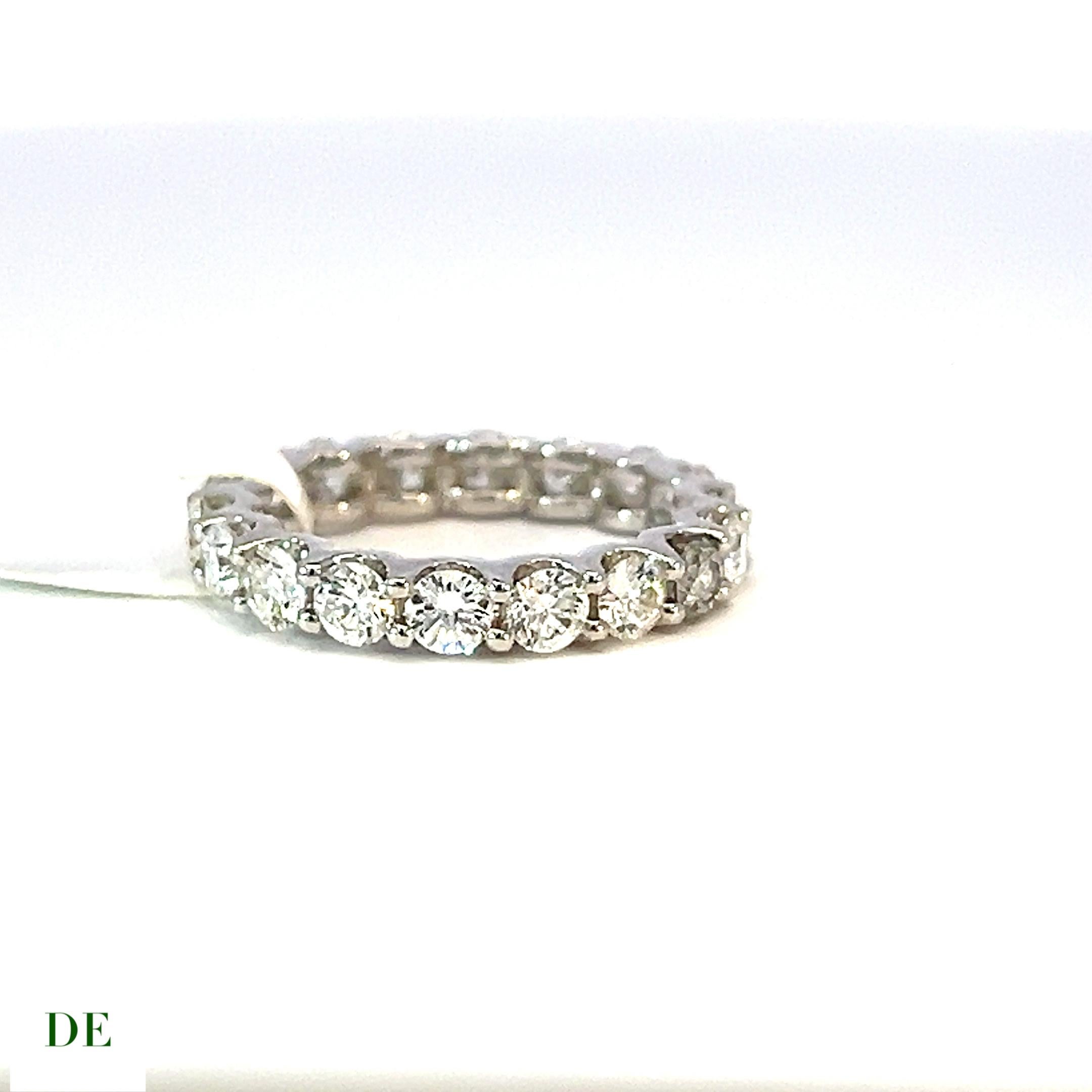 Classic 14k Gold 2.18 Carat Elegant Eternity Band Diamond Ring

Introducing the exquisite Classic 14k Gold Elegant Eternity Band Diamond Ring, featuring a mesmerizing 2.18 carats of diamonds. This ring is the epitome of timeless elegance and