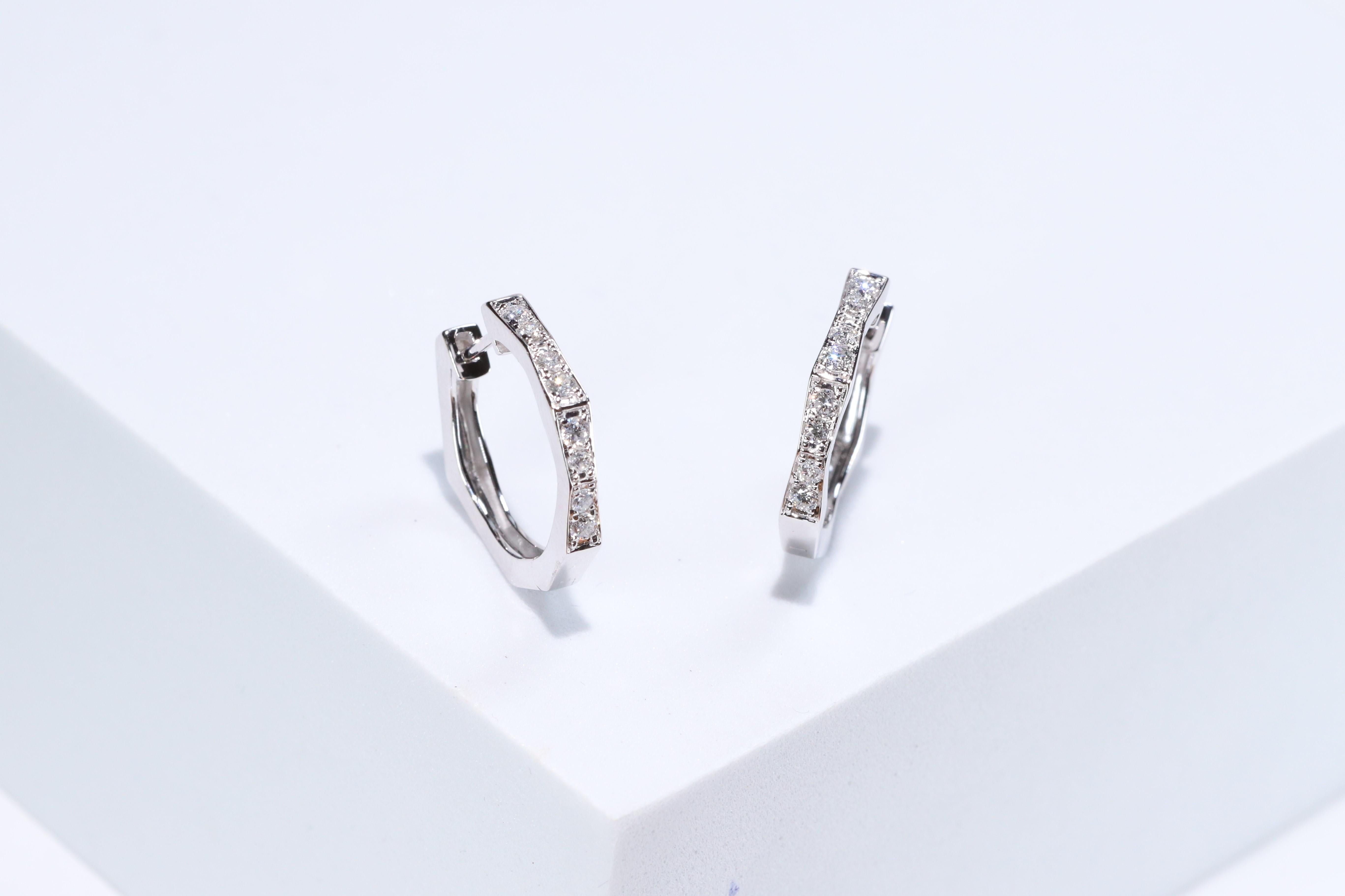 Each of these pretty earrings from Gin & Grace features a on a lever back clasp adorned with white diamonds. These earrings are made of rich 14-karat White gold with a high polish. Diamonds: 16 pcs Diamond cut: Round Diamond weight: 0.34 carat