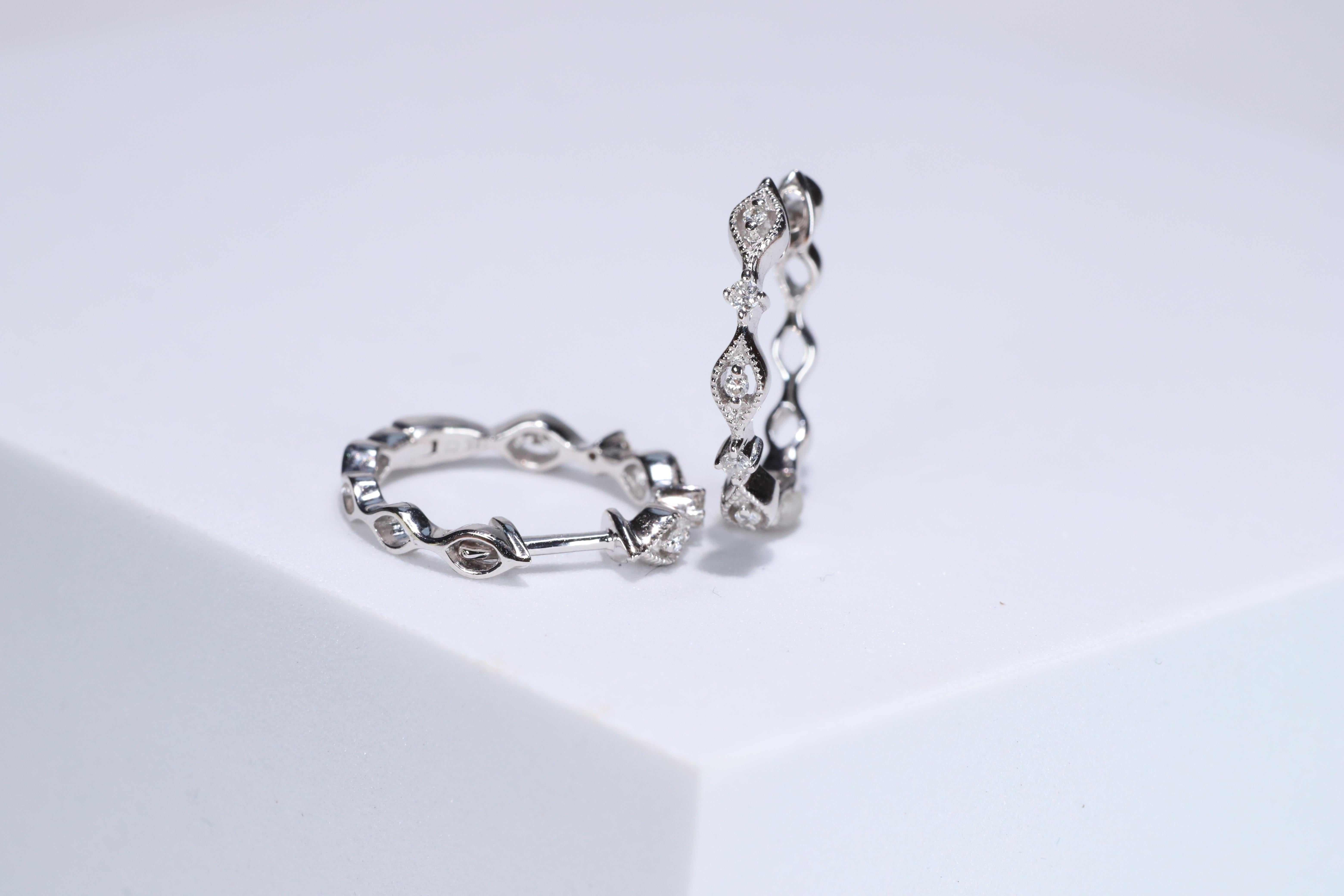 Each of these pretty earrings from Gin & Grace features a on a lever back clasp adorned with white diamonds. These earrings are made of rich 14-karat White gold with a high polish. Diamonds: 10 pcs Diamond cut: Round Diamond weight: 0.11 carat