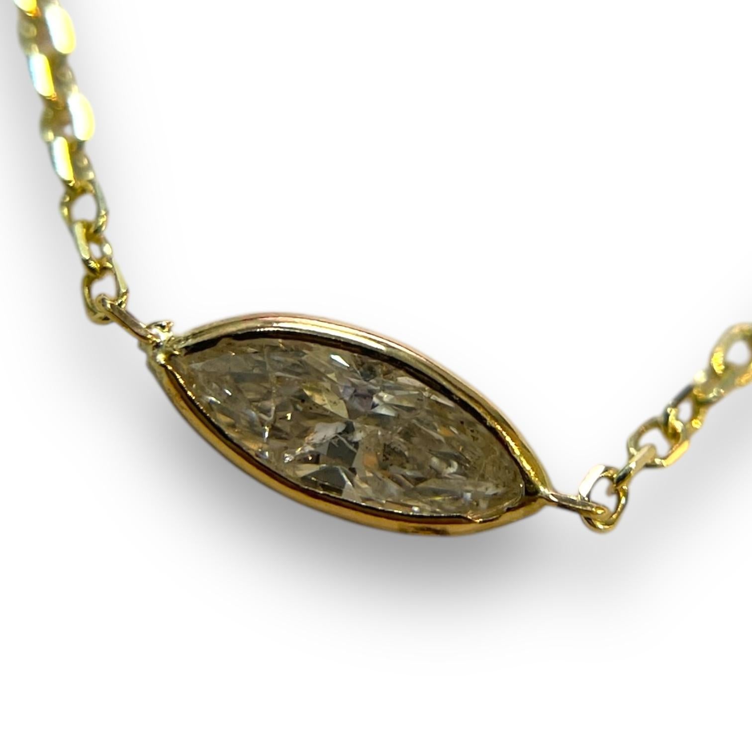 A classic masterpiece, this 0.55ct natural marquise-cut diamond is bezel-set in 14K yellow gold, exuding understated elegance. With an adjustable 16-18 inch chain, it’s the perfect blend of timeless design and everyday wearability.