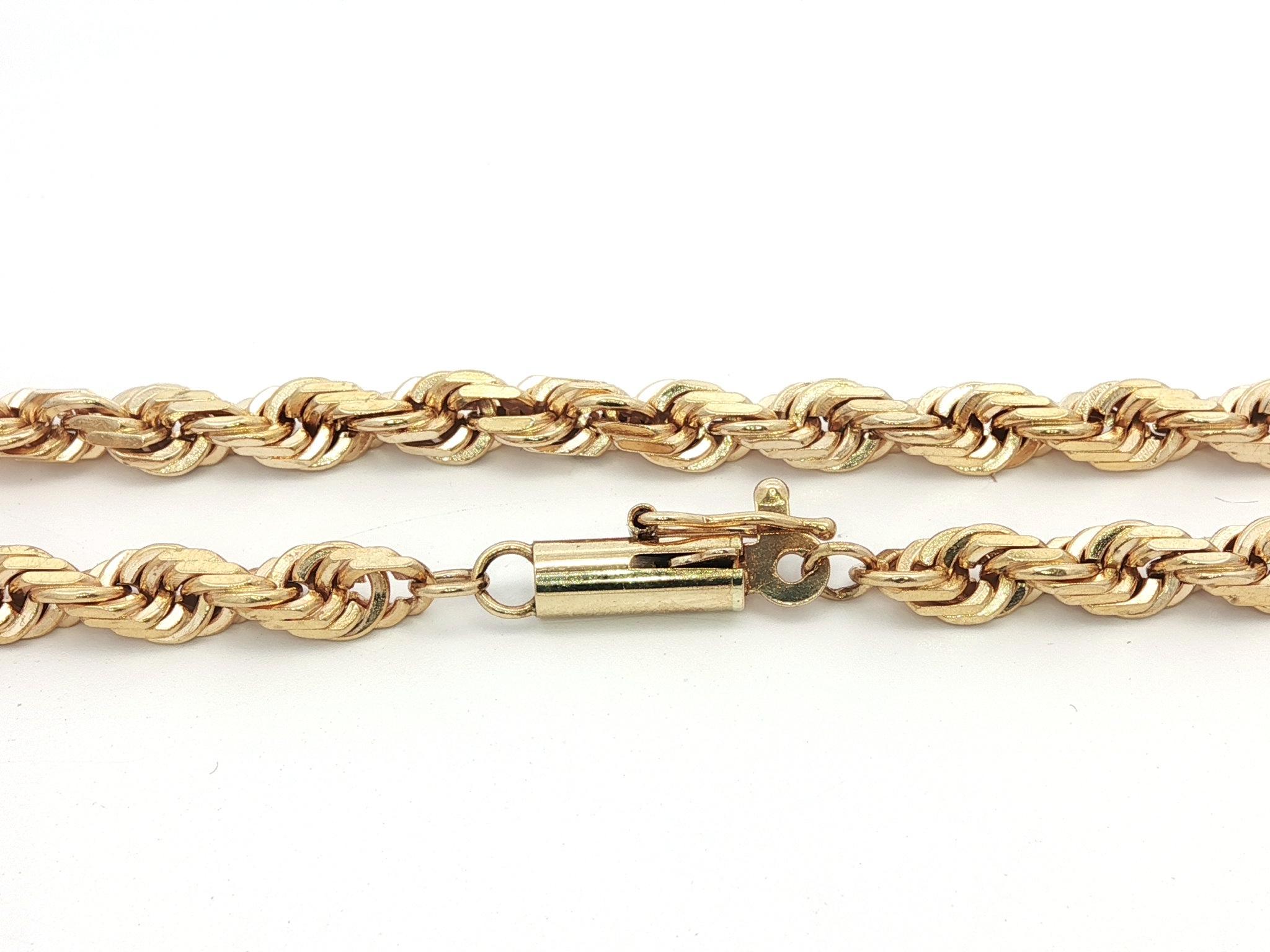 MATERIAL : Or jaune 14k massif 
Poids : 28,59 grammes
Type de chaîne : Maillon de corde 
Longueur de la chaîne : 24 pouces (mesurée à côté de la règle)
Largeur de la chaîne : 3mm (0.11