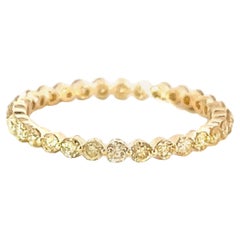 Classic 14k Yellow Gold .69 Carat Round Golden Diamond Eternity Band Ring
