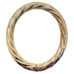 Pulsera clásica de oro amarillo de 14 quilates Cable Twist