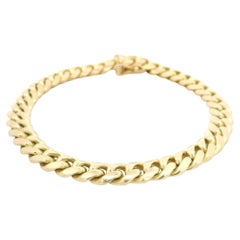 Bracciale classico a maglie cubane in oro giallo 14k con chiusura a pressione e chiusura di sicurezza