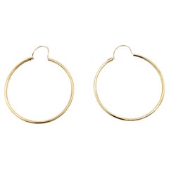 Orecchini a cerchio classici in oro giallo 14k
