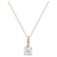 Classic 14k Yellow Gold Round-cut White Diamond Pendant