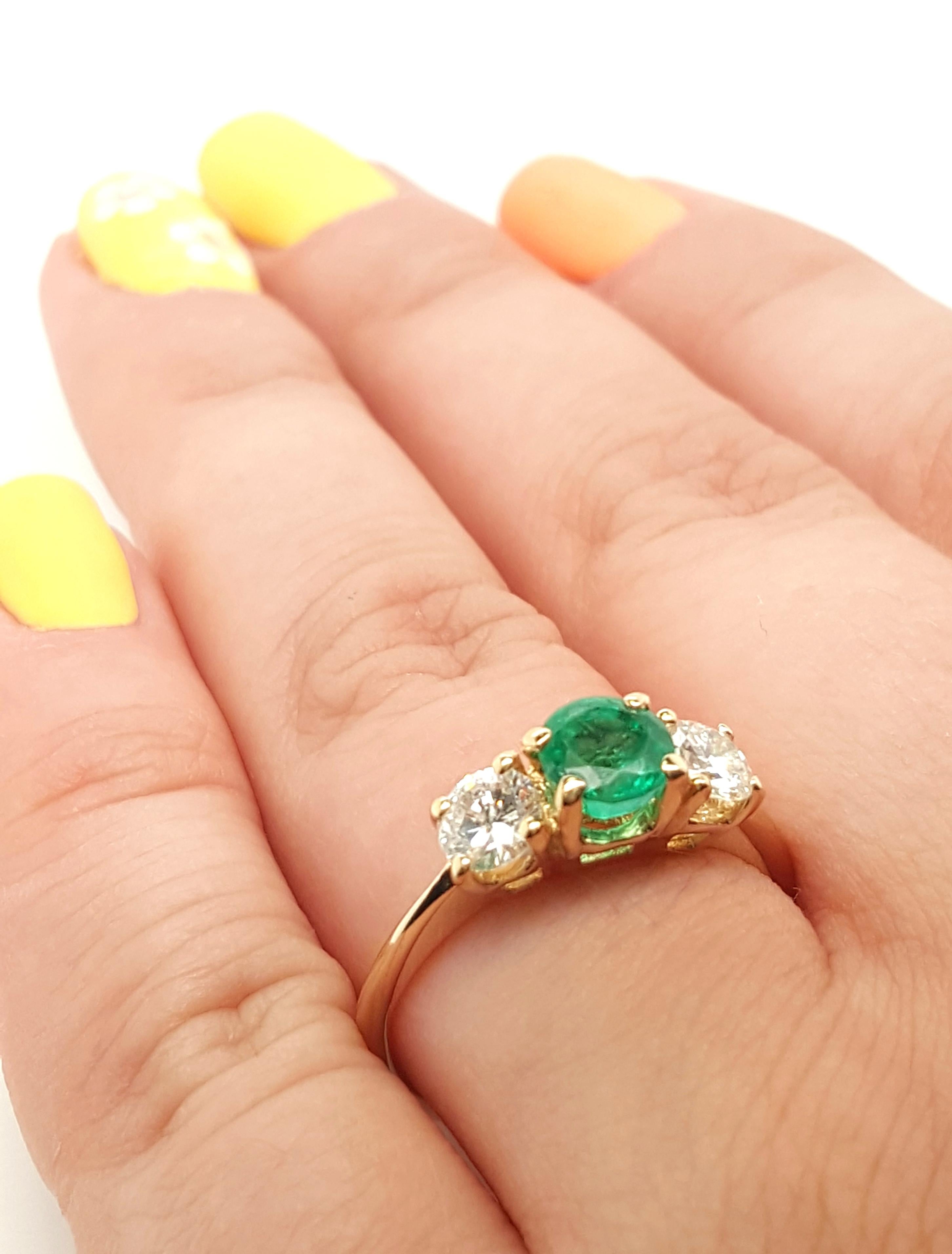 Contemporary Classic 14 Karat Yellow Gold Three-Stone Emerald and Diamond Ring