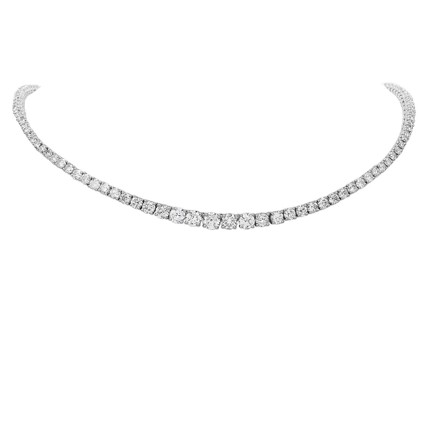 Simply Stated.......Stunning!
This Diamond Necklace was inspired by a Riviera design and crafted in platinum.

Tapering from   4.2mm to 2.50mm. This necklace features beautifully matched bright white Diamonds
from end to end.  Weighing collectively