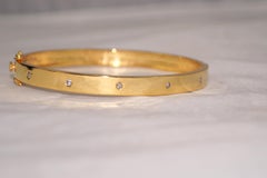 Bracciale classico a cerniera in oro 18 carati con 5 diamanti