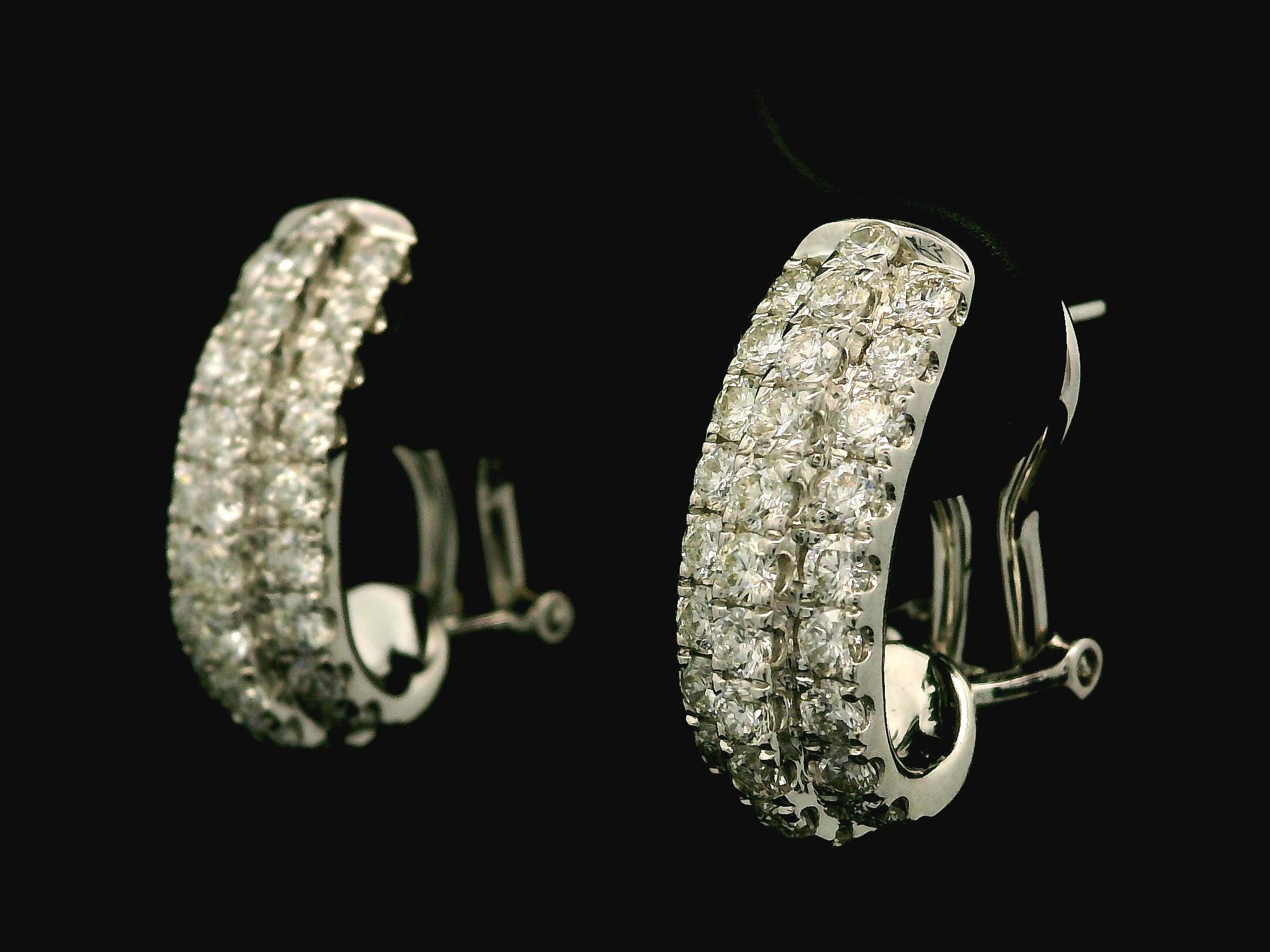 --Stone(s):--
(58) Natural Genuine Diamonds - Round Brilliant Cut - Pave Set - G/H Color - VS1/VS2 Clarity -  High Quality Brilliant Diamonds
Total Carat Weight: 1.16 (approx.)

Material: Solid 18k White Gold
Weight: 5.11 Grams
Backing: Posts w/