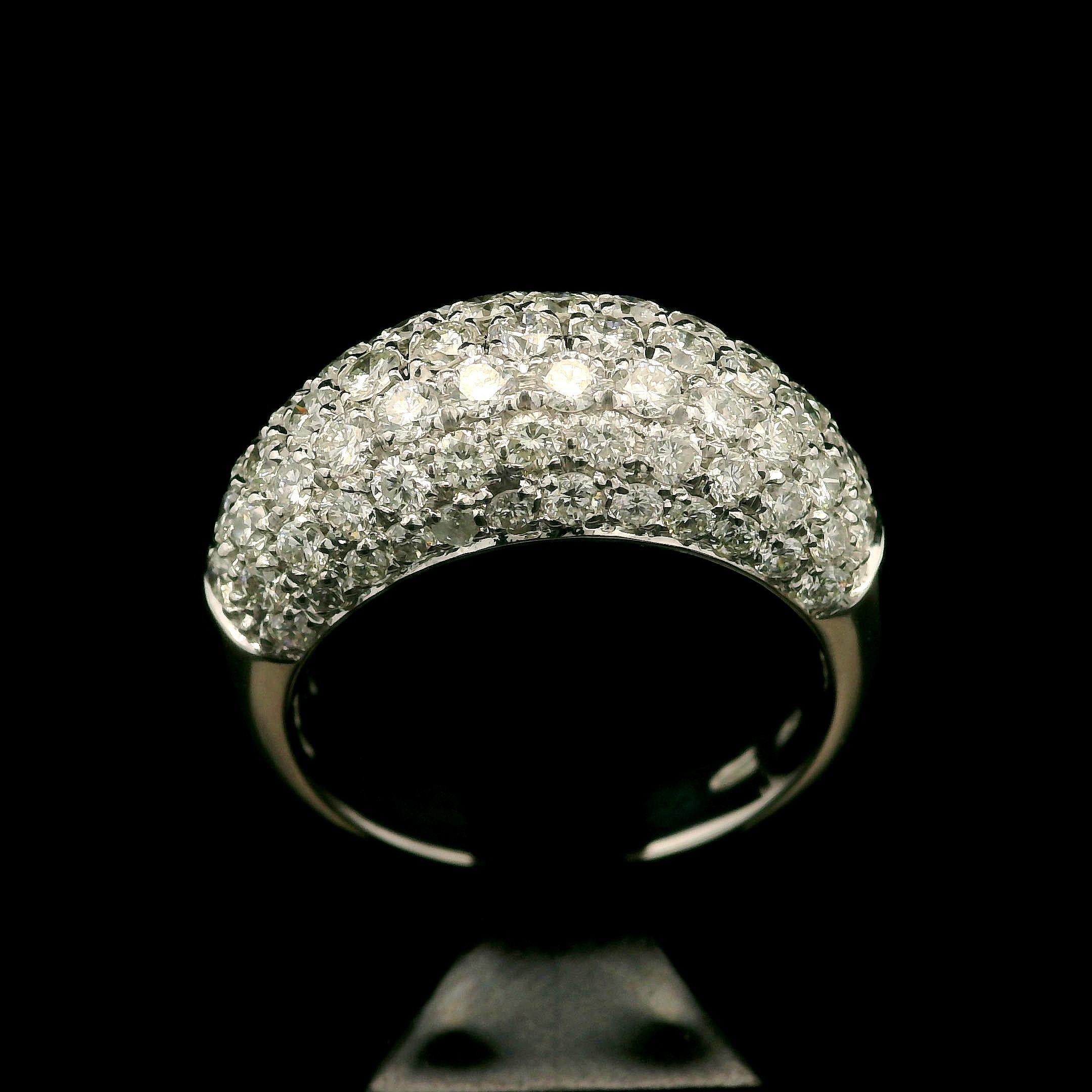 –Stone(s)–
(81) Natural Genuine Diamonds - Round Brilliant Cut - Pave Set - Fiery - H/I  Color - VS1-SI2 Clarity - 2.0ctw (approx.)

Material: 18k White Gold
Weight: 7.64 Grams
Ring Size: 7.0 ( fitted on finger, please contact us prior to purchase