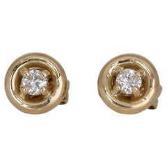 Boucle d'oreille classique en or blanc 18 carats avec un diamant de 0,20 carats