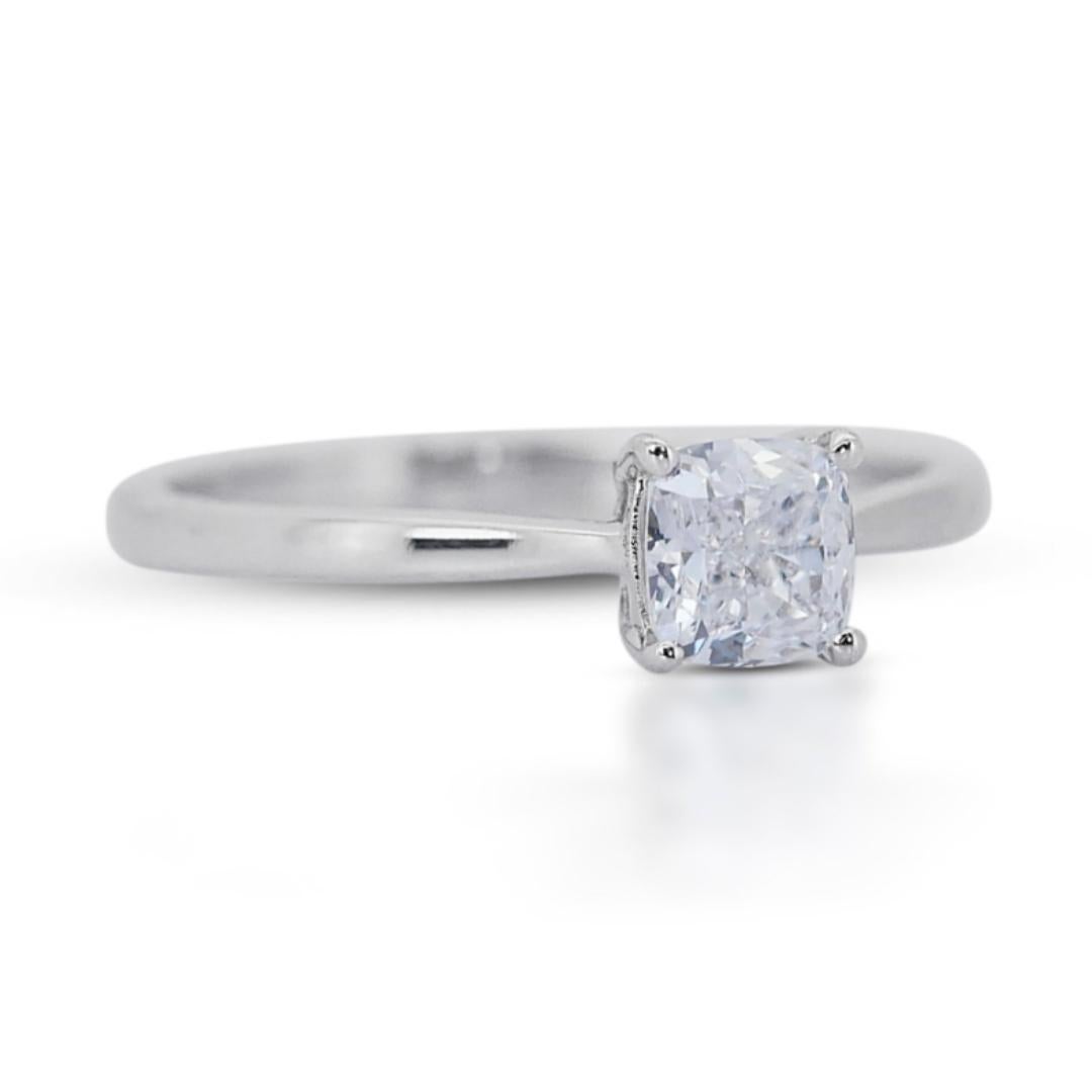 Introducing our exquisite solitaire ring, featuring a dazzling main stone of 1.05 carats. This captivating piece boasts a Cushion Modified cut, with a pristine Color Grade of D and an exceptional Clarity Grade of VVS1, this ring epitomizes pure