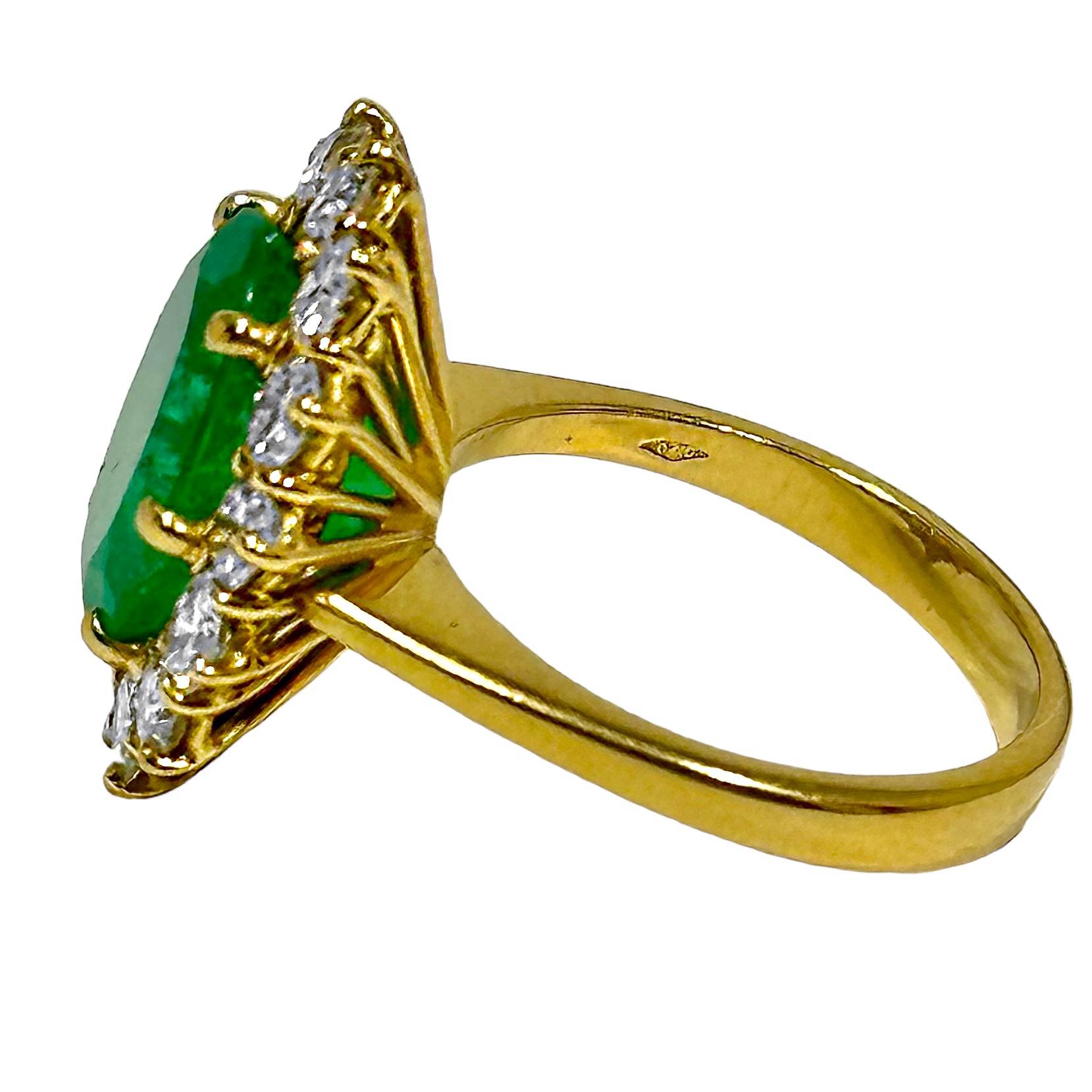 Oval Cut Classic 18K Yellow Gold Cocktail Ring with Oval Emerald Framed by Round Diamonds For Sale