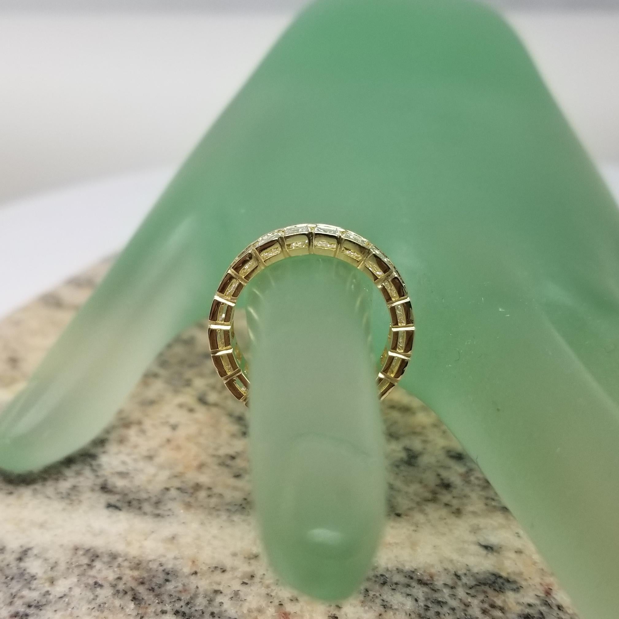 Contemporary Classic 18k Yellow Gold Emerald Cut Diamond Channel Set Eternity Ring 5.10 Carat