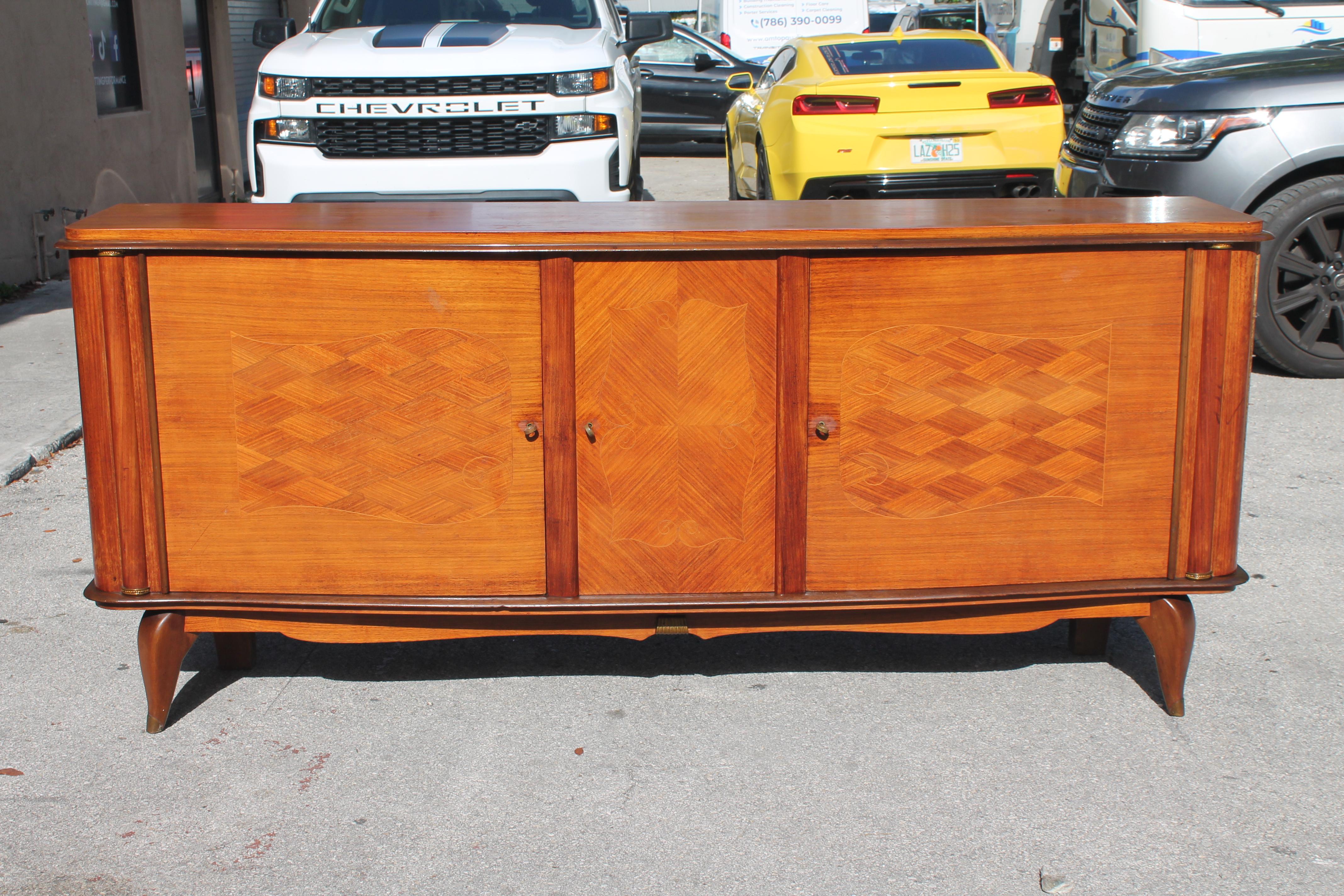 Classic 1940's French Art Deco Rosewood Grand Buffet/ Sideboard/ Credenza/ Dry Bar. Interior storage area finished in Sycamore.  Parisian Estate find.