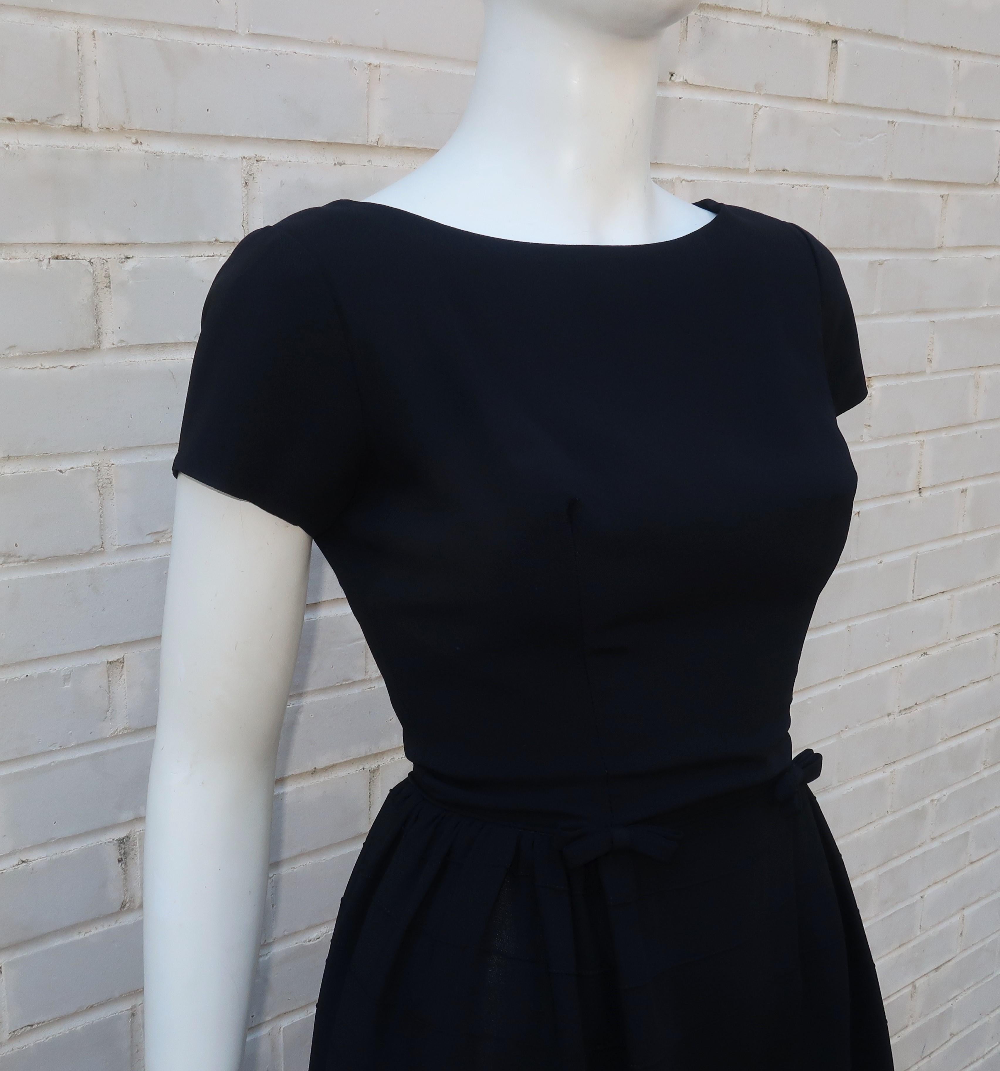 Channel a 1950's Audrey Hepburn look ... girlish and sophisticated ... with this classic 1950's 'little black dress' for the Best & Co. New York label.  For decades, B & C offered great American designs to its customers often from young in-house