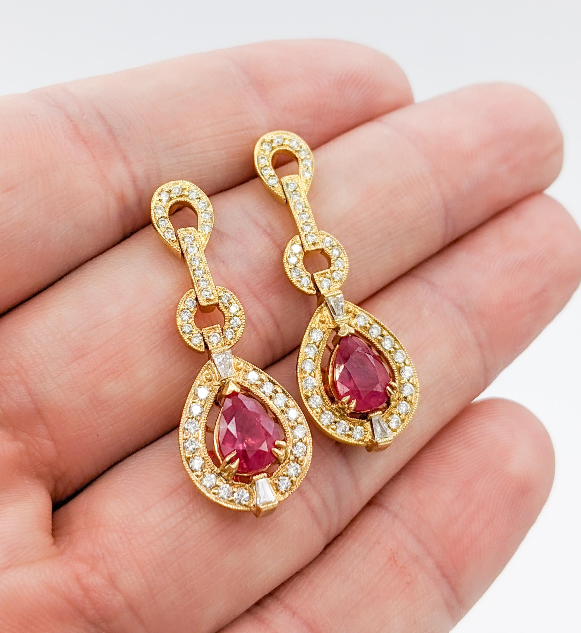 Classic 2.73ctw Ruby and Diamond Drop Earrings

These classic drop ruby earrings are made of 14kt yellow gold. They have .89ctw round white diamonds with a clarity of SI1 and a G-H color. The earrings also hold two noticeable pear-cut rubies with a