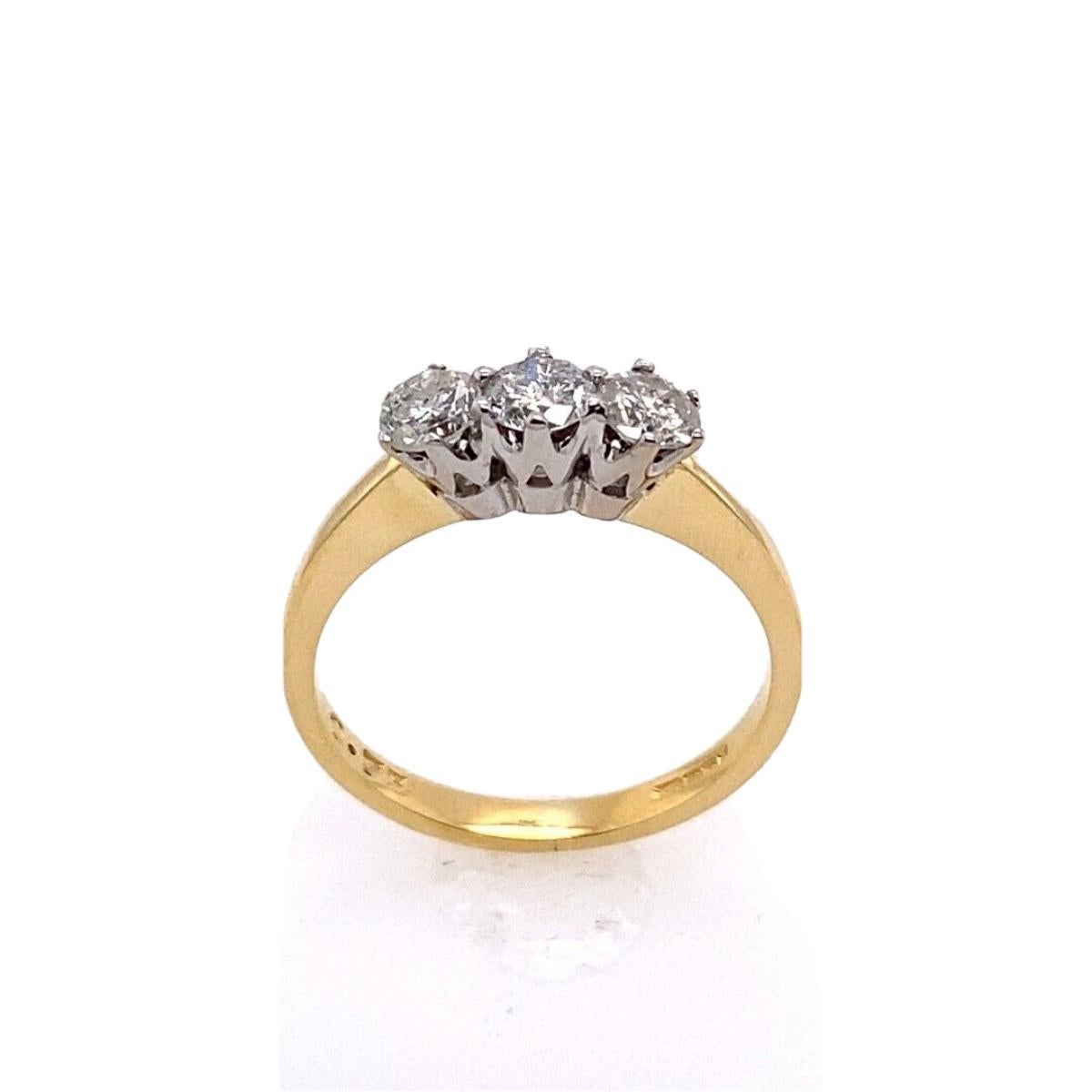Classic 18ct Yellow Gold 3-Stone Trilogy Ring, Set With 3-Diamonds, 0.75ct

This classic three-stone trilogy ring is set with three diamonds. Is a beautiful ring that can be worn by itself or as part of a stackable ring collection. The three stones