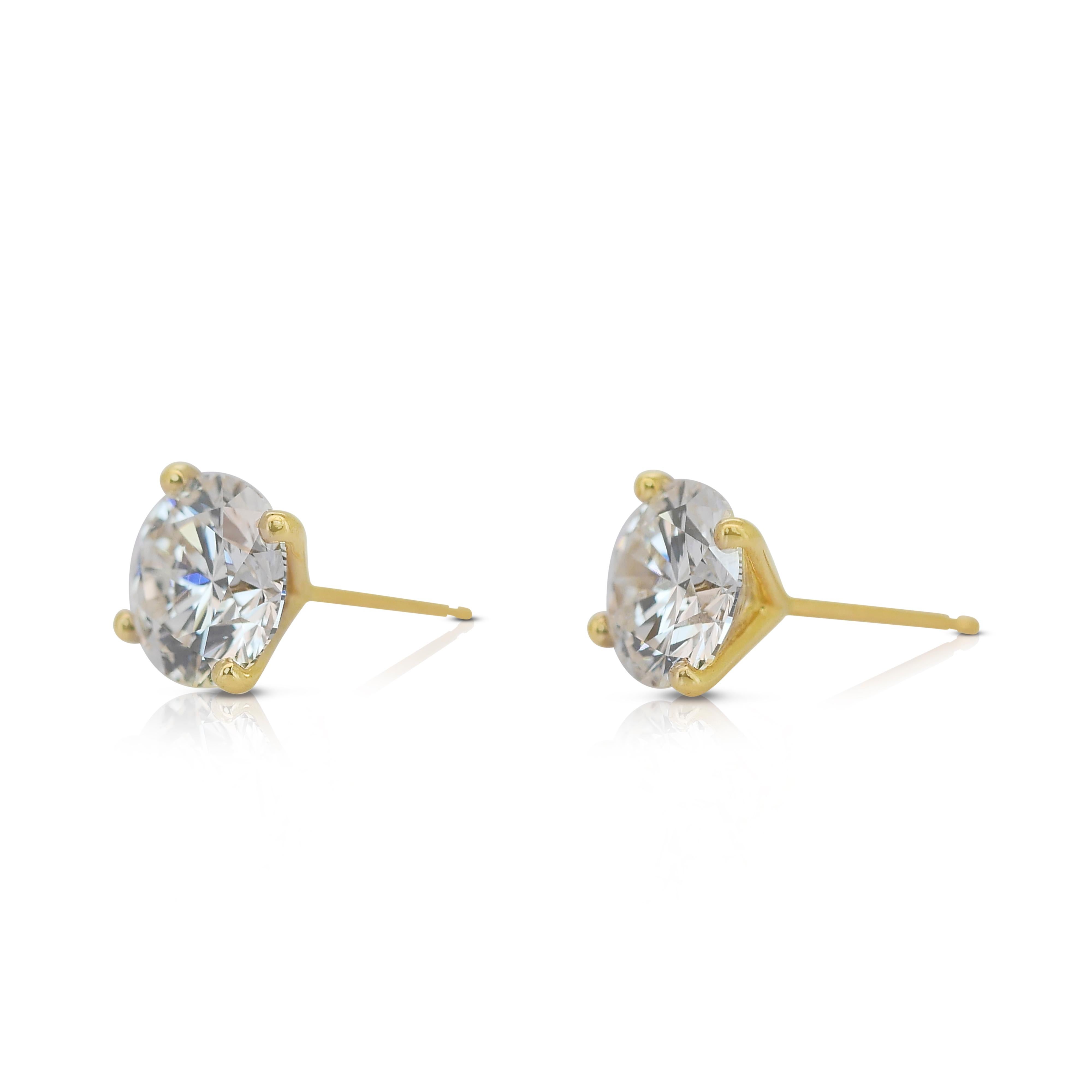 Classic 3.00ct Triple Excellent Ideal Cut Diamonds Stud Earrings in 18k Yellow Gold - GIA Certified

These exquisite 18k yellow gold diamond stud earrings showcase two perfectly matched round diamonds with a total carat weight of 3.00-carat. Each