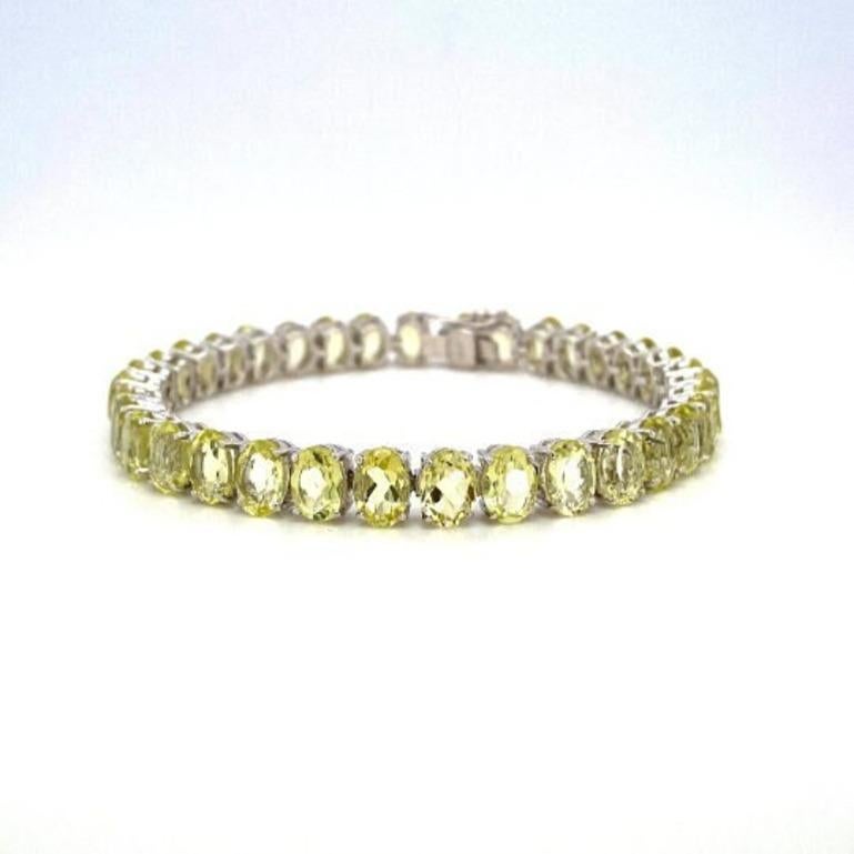 Classic 32.60 Carat Lemon Quartz Tennis Bracelet for Her in sterling silver showcases endlessly sparkling natural lemon quartz, weighing 32.60 carat. It measures 7 inches long in length.
Lemon Quartz stimulate concentration and reduces stress.