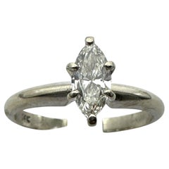 Classic .41 carat marquise–shaped diamond solitaire ring in 14 karat white gold