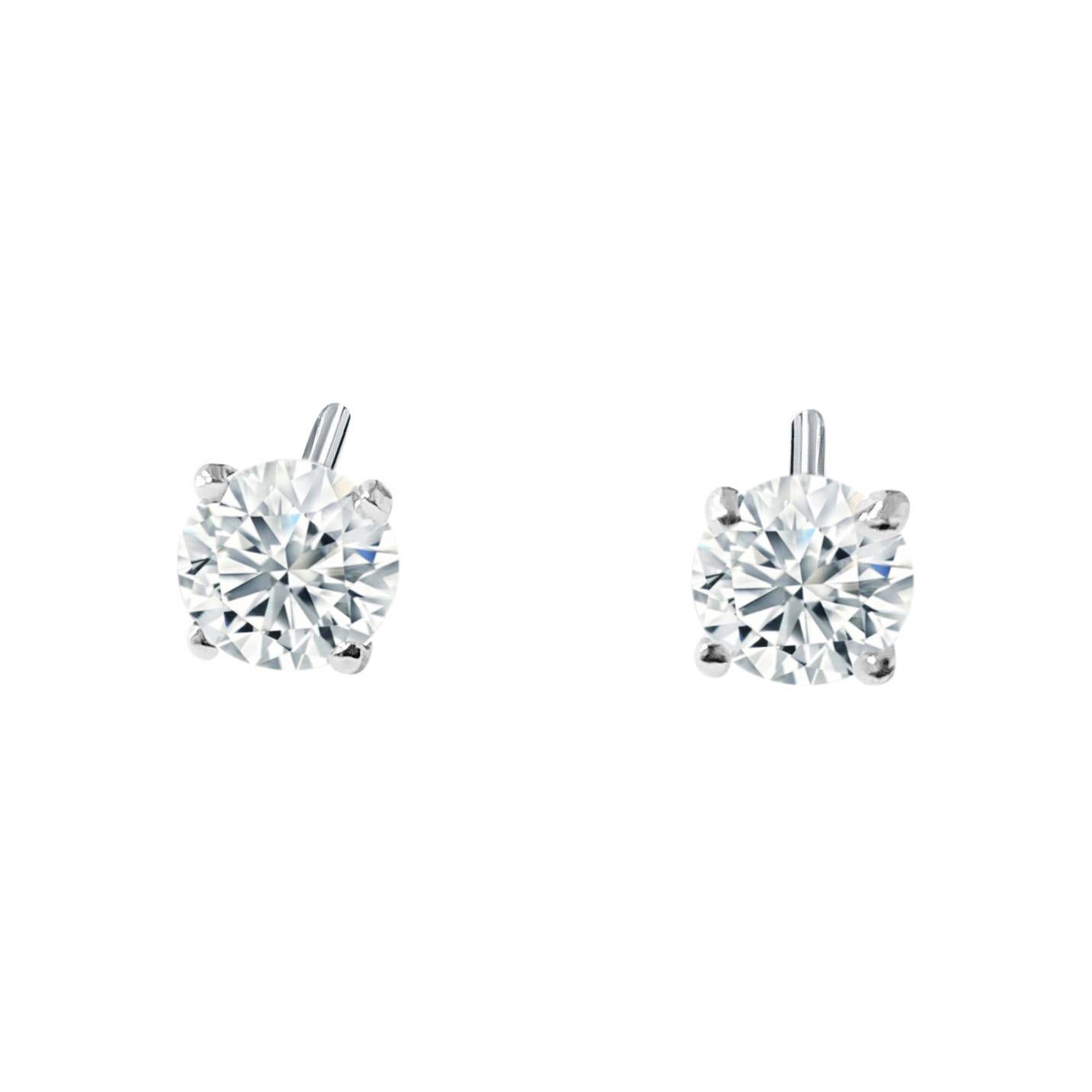 Metal: 14k white gold

Diamonds: 0.50 cwt. 
I1-I2 clarity. G-H color.
Round brilliant cut. 
100% natural earth mined diamonds. 

Classic 4 prong diamond studs. Pushback stud earrings. Beautiful unisex fine jewelry. 
