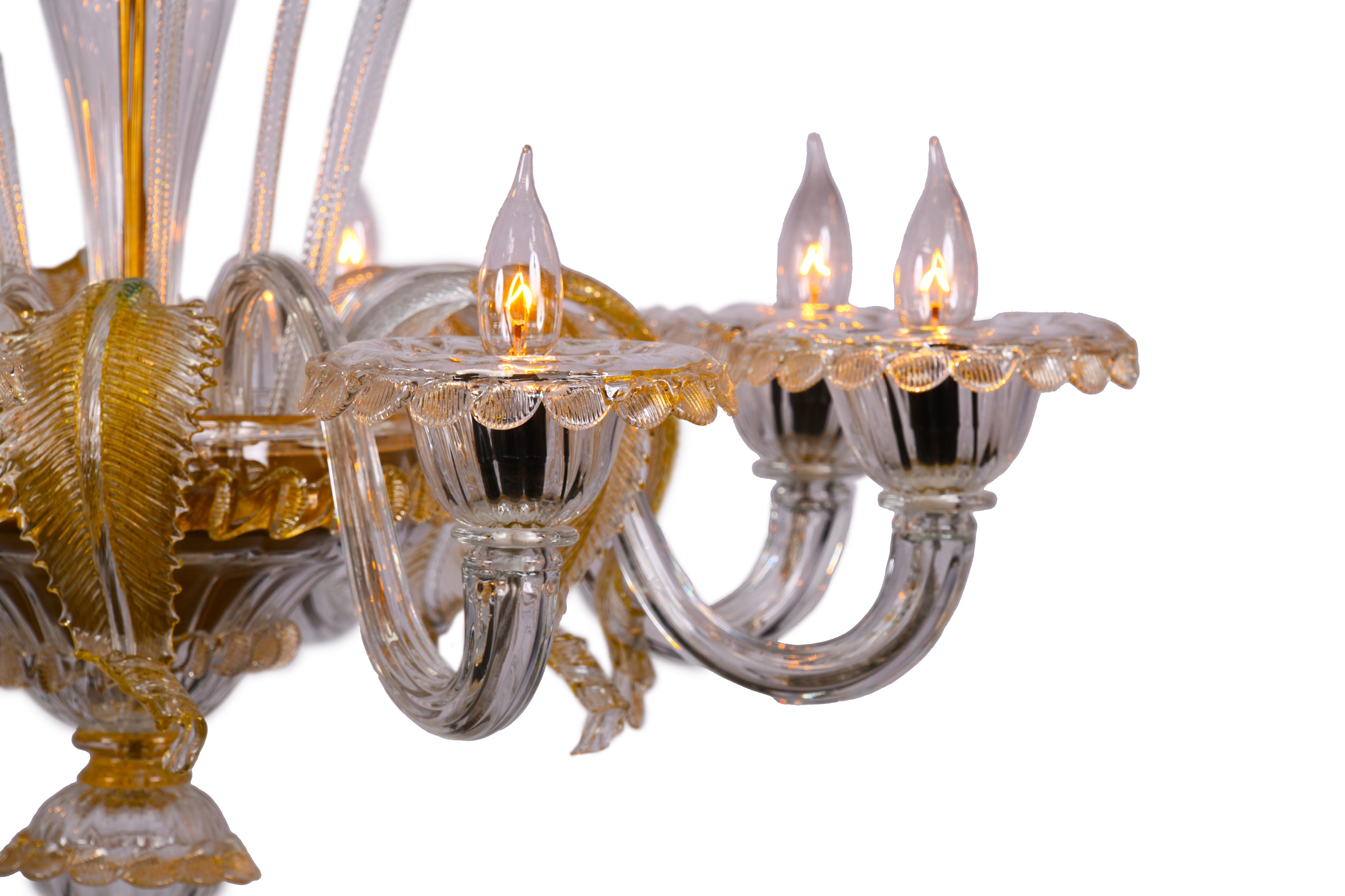 A delightful 1960s pendant from the Murano masters. With hand blown clear glass body and arms with hand crafted amber flowers and clear and amber detailing. 

Thomas Cooper Studio represents a multilayered, multifaceted collaboration, where
