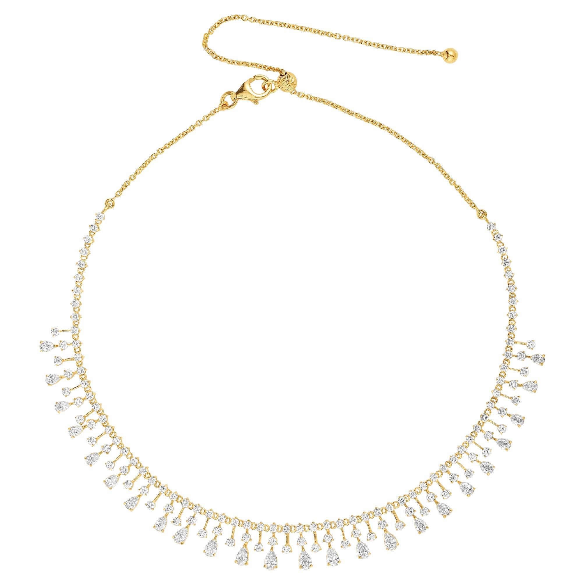 Graduating pear shape diamonds from 0.25 carats to 0.10 carats, in combination with 0.05 carat round diamonds. This choker is made in 18k white gold, and has a self adjustable ball chain mechanism. 

Kamyen's Classic Pret-a-Porter Choker!