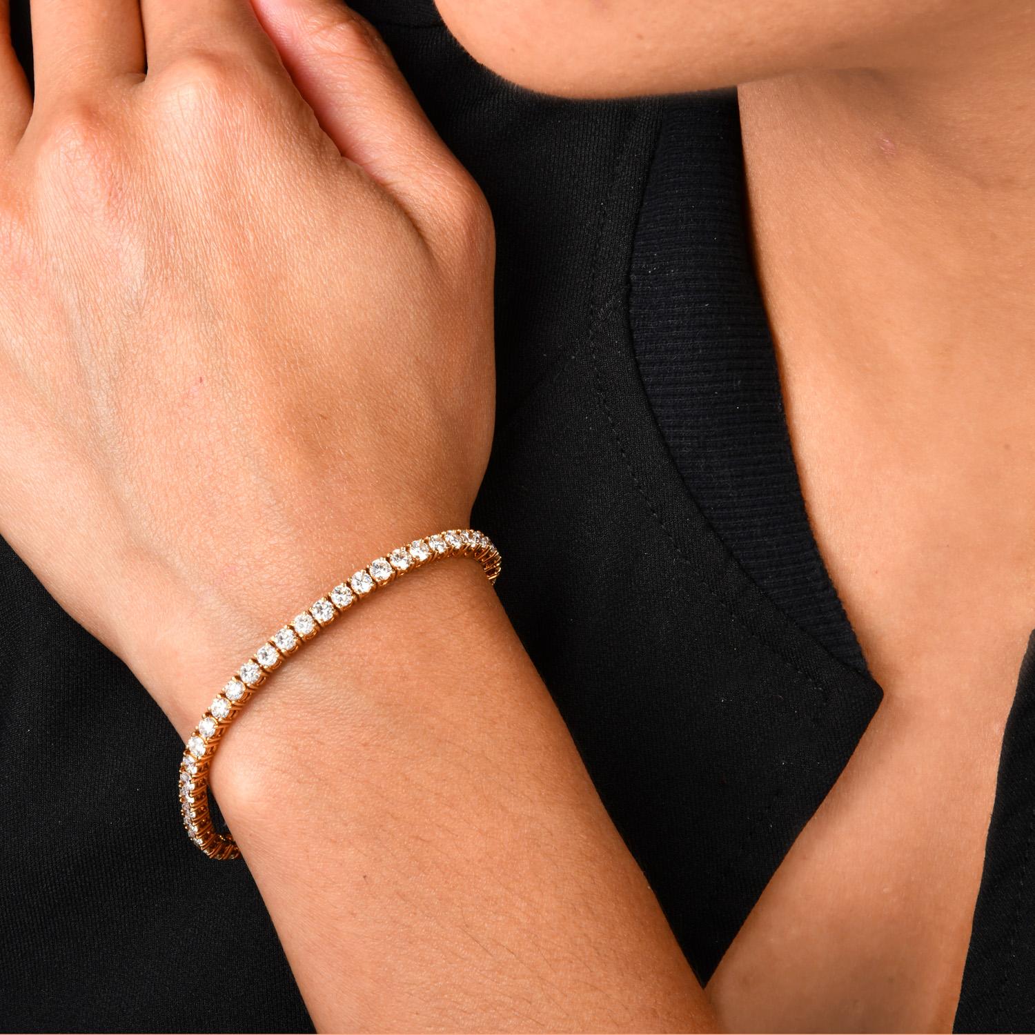 Wear this vibrant bracelet alone or stack it with others.

48 icy round cut diamonds run from end to end in this flexible line bracelet.  Cumulative natural diamond weight is appx. 6.70 carats, graded I color and VS1 clarity.

Every natural diamond