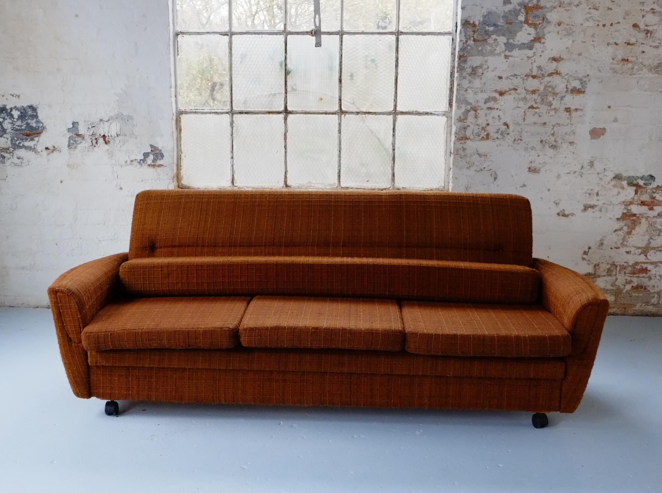Classic 70's Vintage British Brown Sofa Bed Settee on Castors 5