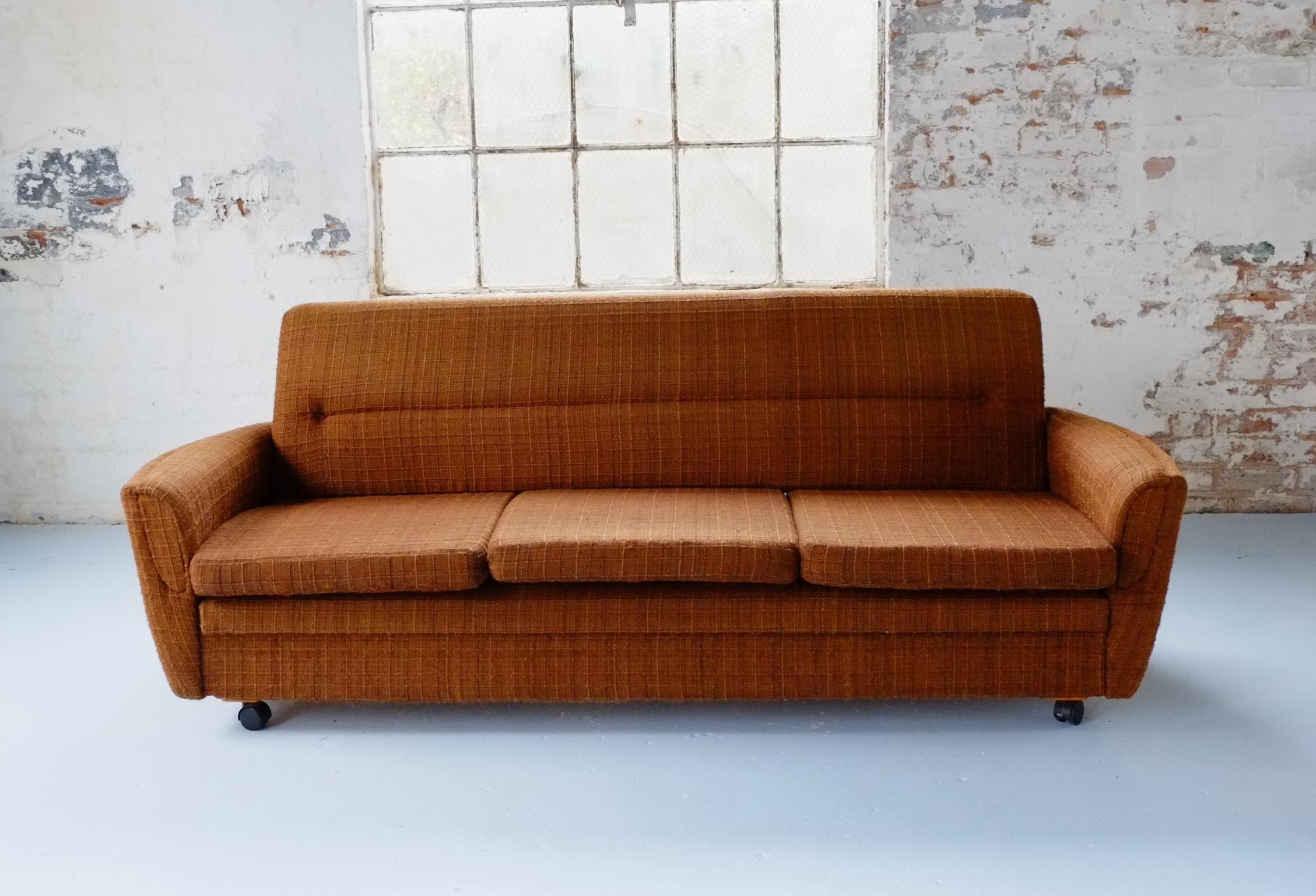 Classic 70's Vintage British Brown Sofa Bed Settee on Castors 9