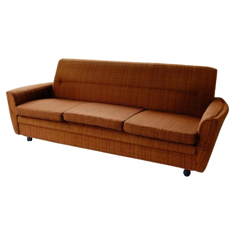 Classic 70's Vintage British Brown Sofa Bed Settee on Castors For Sale