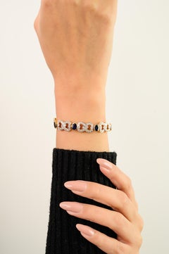 Pulsera clásica de eslabones corazón en oro de 14 quilates con zafiro azul de 7,22 quilates y diamantes de 2,8 quilates