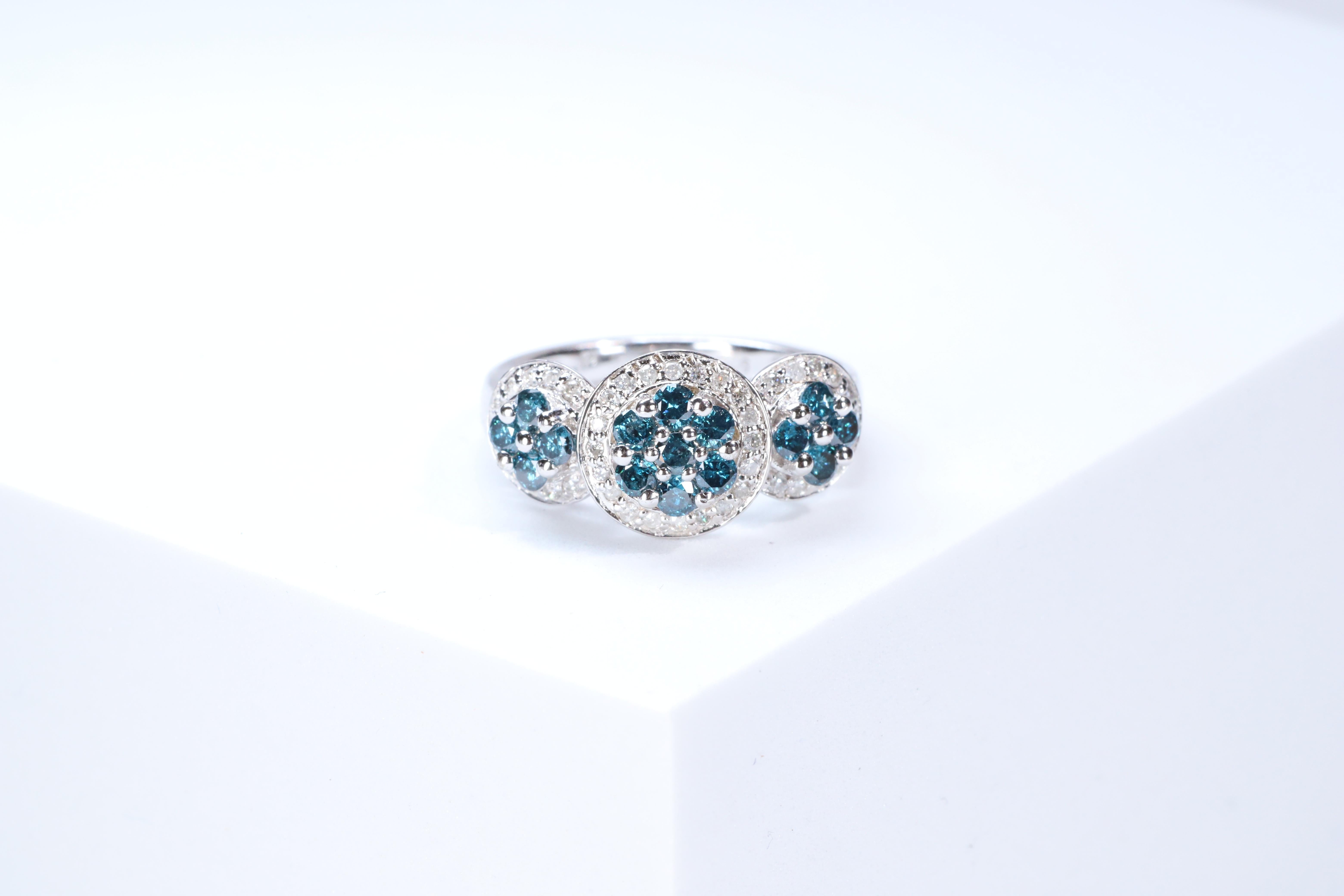 Stunning, timeless and classy eternity Unique Ring. Decorate yourself in luxury with this Gin & Grace Ring. The 925 Sterling Silver jewelry boasts with Natural Round-cut white Diamond (42 Pcs) 0.23 Carat, Round-cut Blue Diamond (15 pcs) 0.73 carat