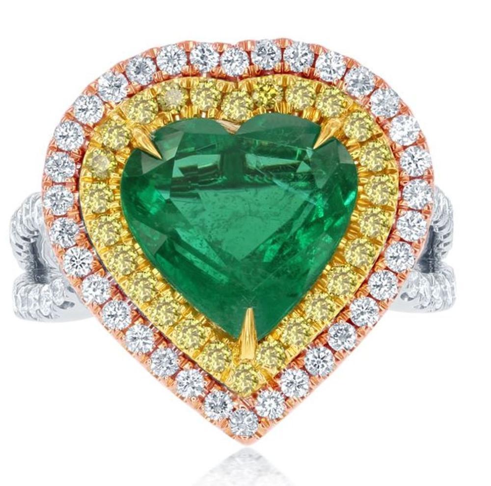 Aesthetic Movement Halo 9.33 Carat Emerald Heart Shape Diamond Three-Stone 18 Karat White Gold Ring For Sale