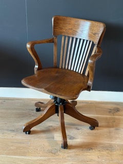 Classic adjustable oak office chair in mint condition
