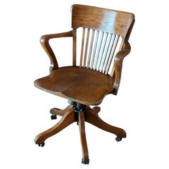 Classic adjustable oak office chair in mint condition