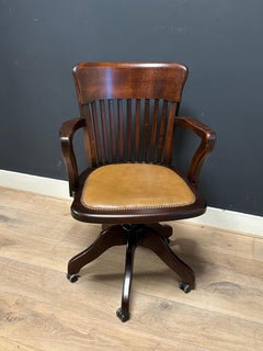 Classic adjustable office chair with leather seat