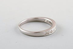 Classic Alliance Ring in 10 Carat White Gold with Numerous Diamonds