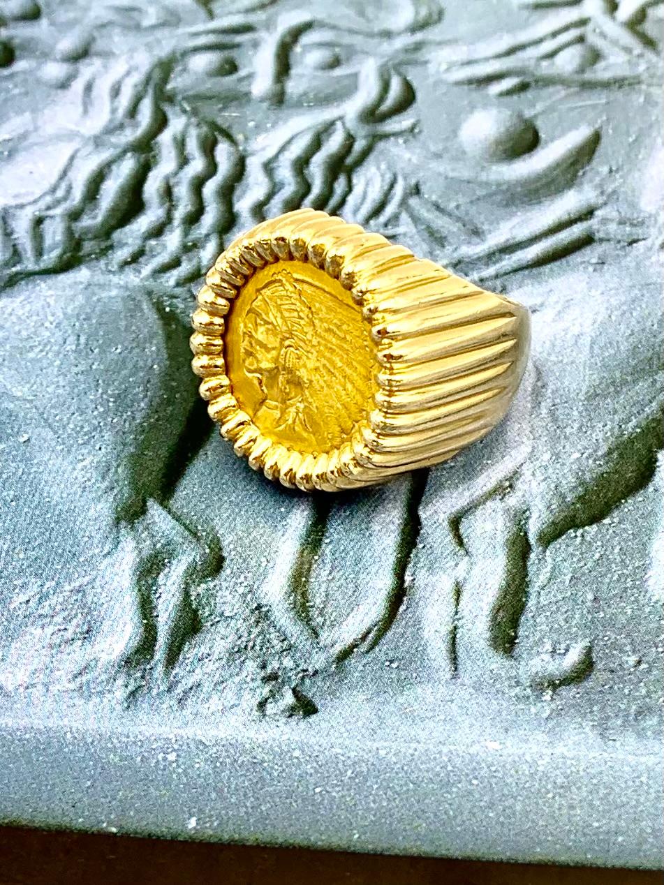Fine estate American Indian Head Quarter Eagle 22K gold antique coin 14K yellow gold ring
Early 20th Century
Attractive, substantial, heavy, high quality reeded gold custom setting.
The Quarter Eagle was designed by Bela Lyon Pratt and minted by the