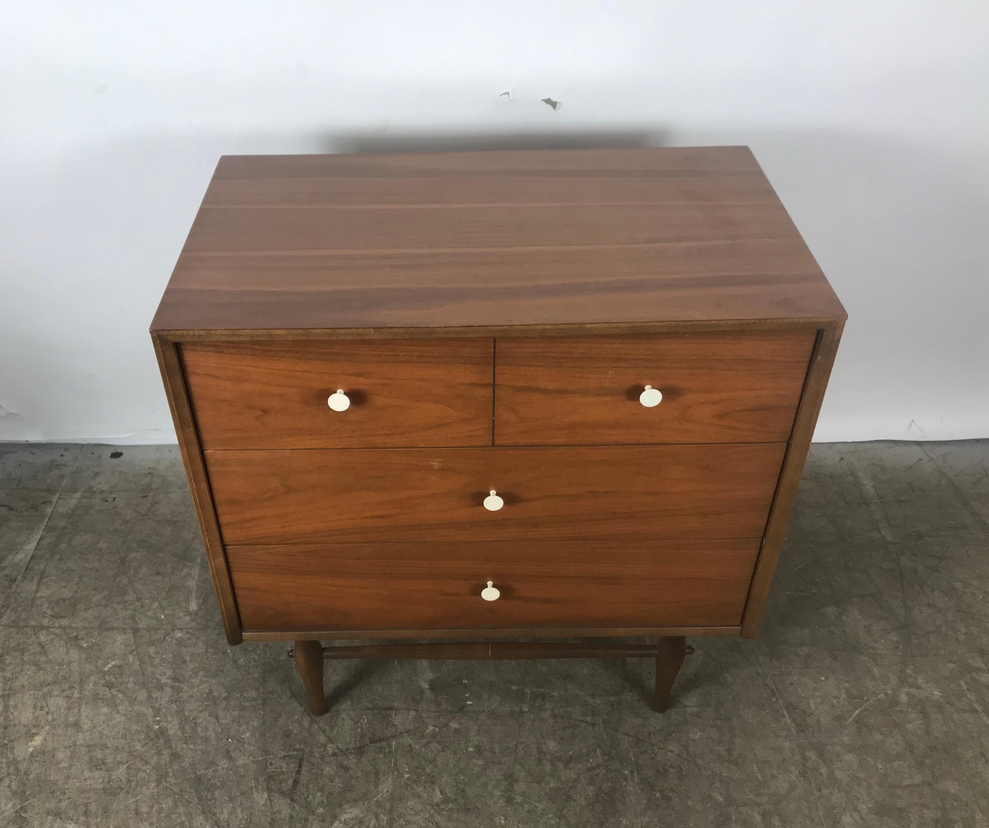 American Modernist 3-drawer chest .. Very reminiscent of the Classic designs by George Nelson, Paul McCobb etc.. Handsome off white porcelain drawer pulls adorn this quality warm walnut wood, nice original finish and patina. Unusual sculptural