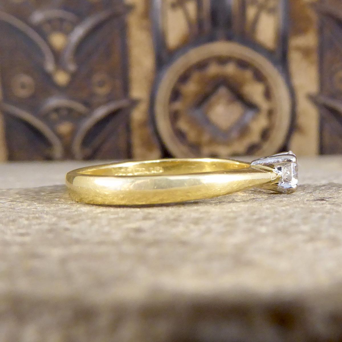 dainty solitaire engagement ring