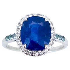 Classic and luxury  “Royal blue color “ Sapphire with alexandrite and diamonds