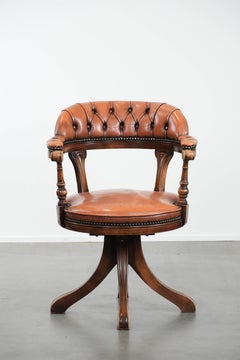 Classic and timeless cow leather and wooden Chesterfield office chair